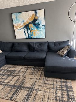 Sofa , rug , picture