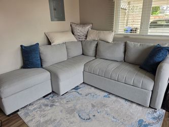 Pull-Out Sleeper Sectional Sofa w/ Storage Ottoman