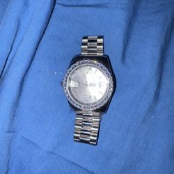 Watch With Diamonds Around It