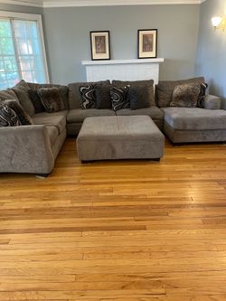 Gray sectional with sofa bed/ottoman