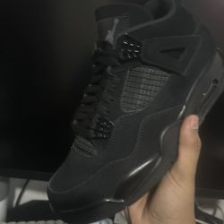 Black Cat Jordan 4s