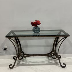 Metal console table with glass top