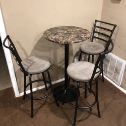 Table with three Chairs 