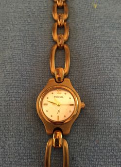 Fossil gold tone watch and bracelet band