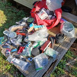 A Bag Of New Bike And Motor Bike Accessories 