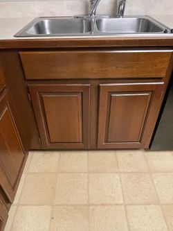 7 wood cabinets plus desk