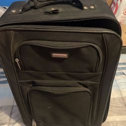 2- Essential Carry On rolling suitcases