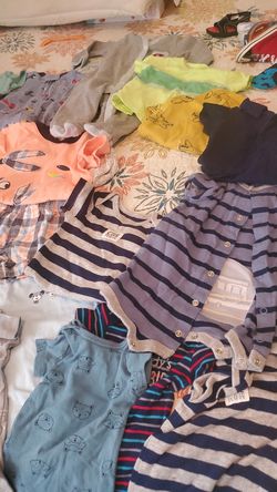 Good condition shorts shirts and onesies