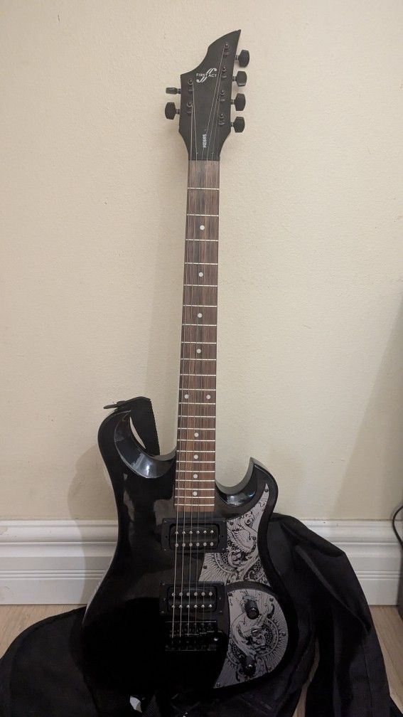 Fist Act ME685 Electric Guitar
