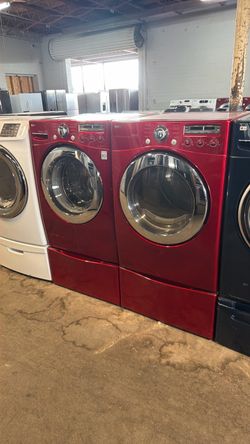 Beautiful washer dryer set RED with bottom drawer pedestals perfect condition