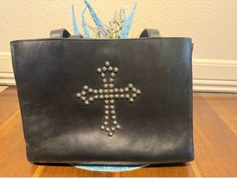 Woman’s black leather purse