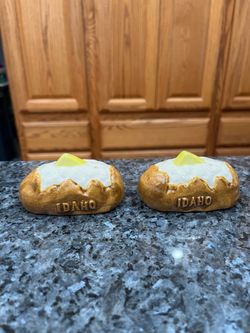 Vintage Ceramic Idaho Split Baked Potato Butter & Sour Cream Pair of Salt  and Pepper Shakers.  Size appropriately 3 inches long.  Preowned never used