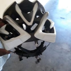 Helmets red and white blue is sm. The two white ones are extra lparge each