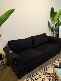 Pull out bed couch with charging outlet