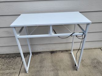 Small metal and wood desk.