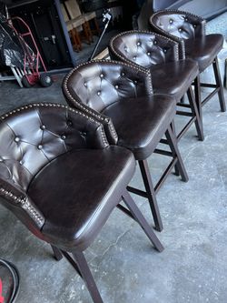 Brown Swivel Backed Barstool 