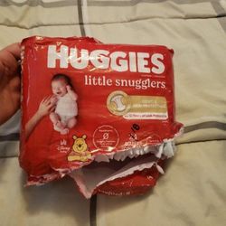 HUGGIES And PAMPERS Both Are  Size NEWBORN