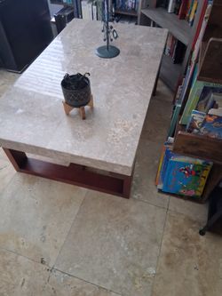 Marble table with red wood frame.  $190.