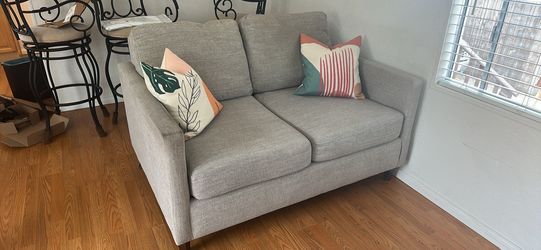 Small couch- love seat with pillows
