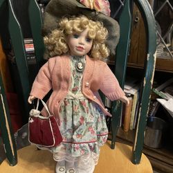 Porcelain Doll. Brass Key Collection