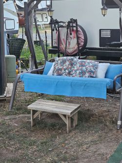 Outdoor Porch Swing with Blue Cushion