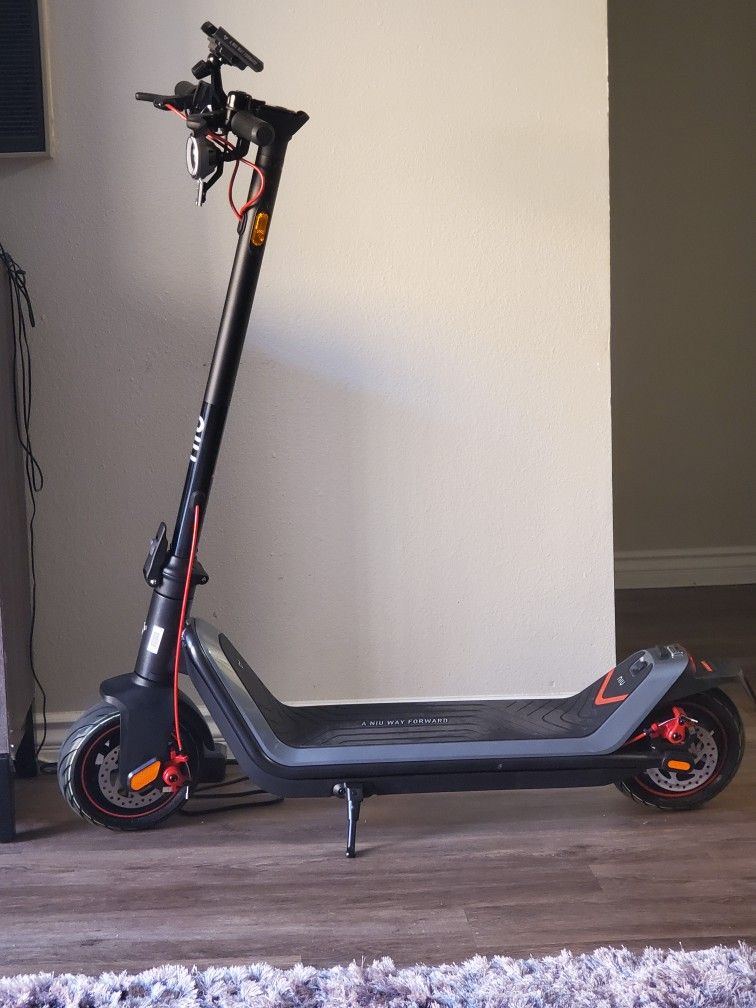 Electric Scooter With Phone Mount And Helmet Included