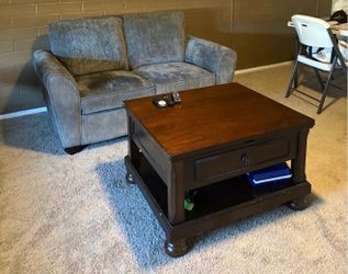 2 glass tables, a coffee table and a couch