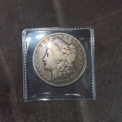 1891 Morgan Silver Dollar. 1.5carot Ruby Gemstone