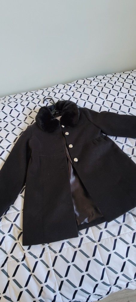 Black coat from children's place. Size 5/6, great condition. Only worn once. Pet/Smoke free home.