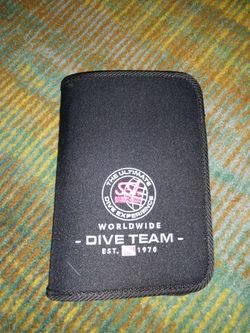 SSI dive log binder.