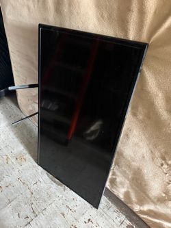 Samsung 50” tv with soundbar and subwoofer