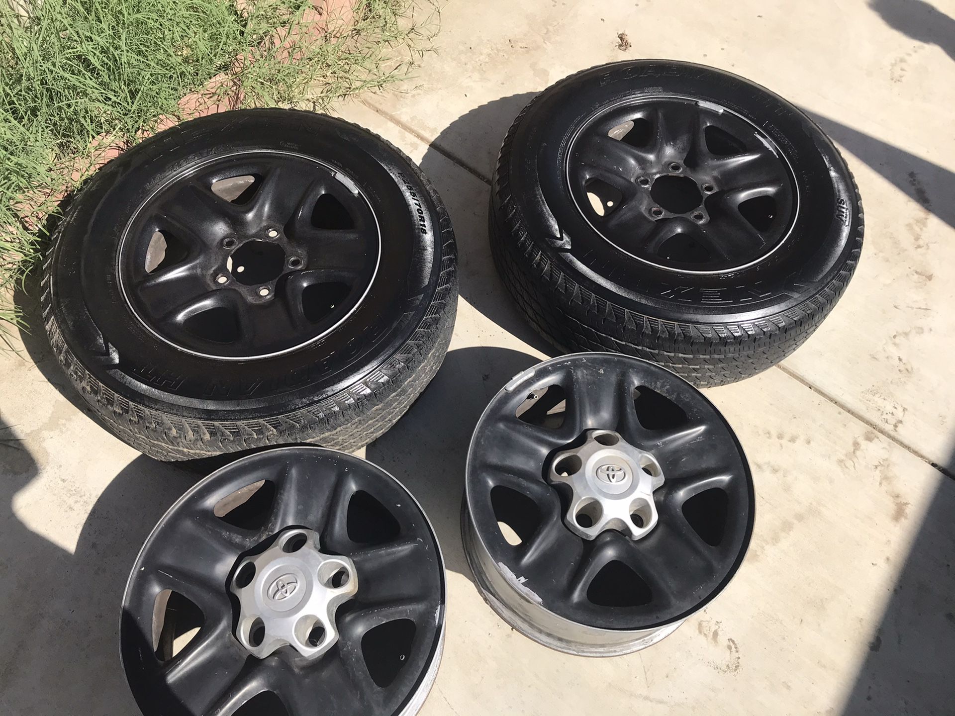 2 Tires and 4 Rims for a Toyota Tundra