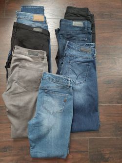 Size 8.          7 Pairs Women Jeans