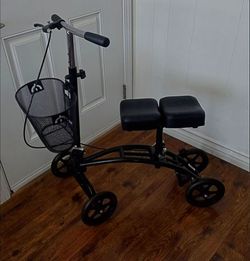 Knee Scooter/Walker.  Matte Black. Front Basket. Right hand brake. Foldable,  Height Adjustable. Great Condition!