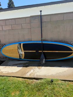 10’6 surftech sup and carbon paddle