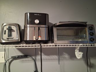 Oaster toaster, instant vortex plus air fryer, and a black and decker toaster oven. All are stainless steel in black and harley used. Can be bought se