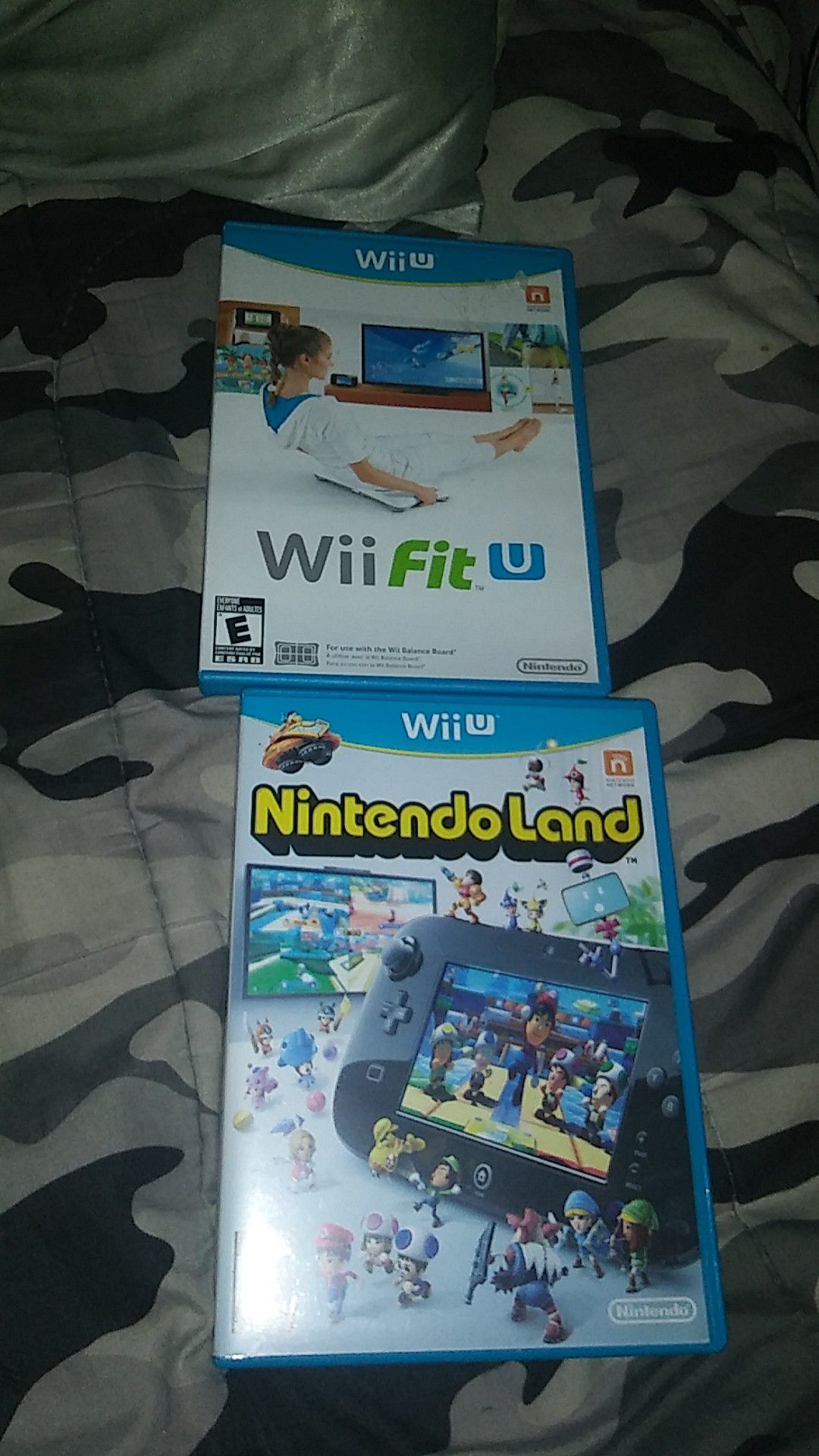 Two wii u video games: Nintendo land and Wii fit u