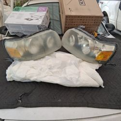 Free Headlights For 05/07 Ford Escape Xlt