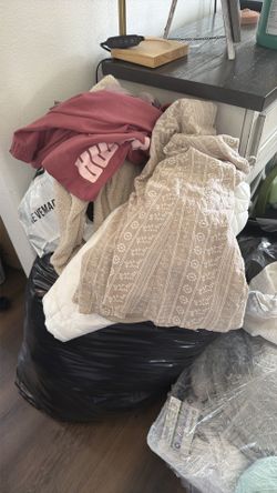Big bag of clothes  some of them brand name  size s and medium