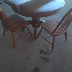 WOODEN TABLE AND 6 CHAIRS