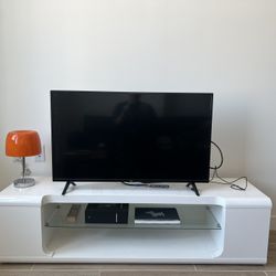 CONSOLE TABLE WITH GLASS COMPARTMENT