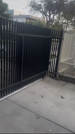 Modern vertical slat gate