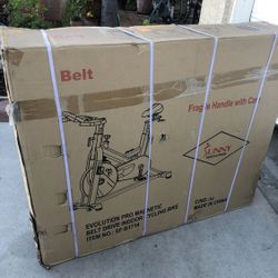 Brand New. Evolution Pro Magnetic Belt Drive Heavy Duty Cycling Bike. Sunny Health And Fitness 