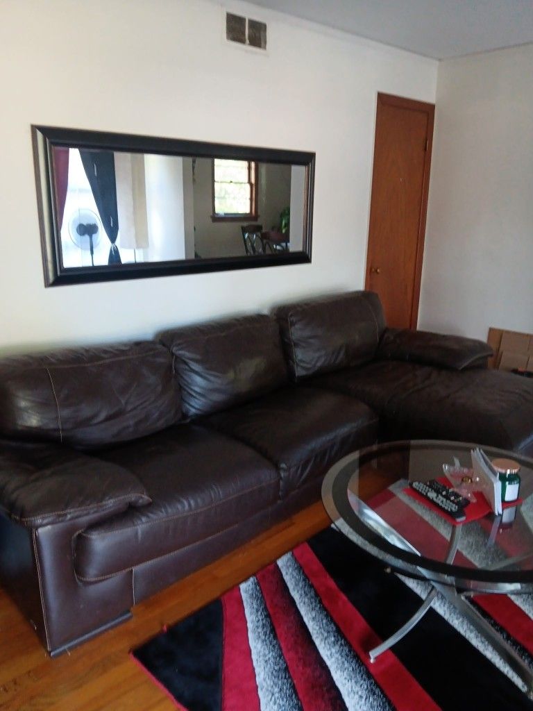 Leather Couch/ Rug And Curtains