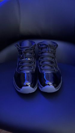 Air Jordan 11 Black Patent Leather Sneakers