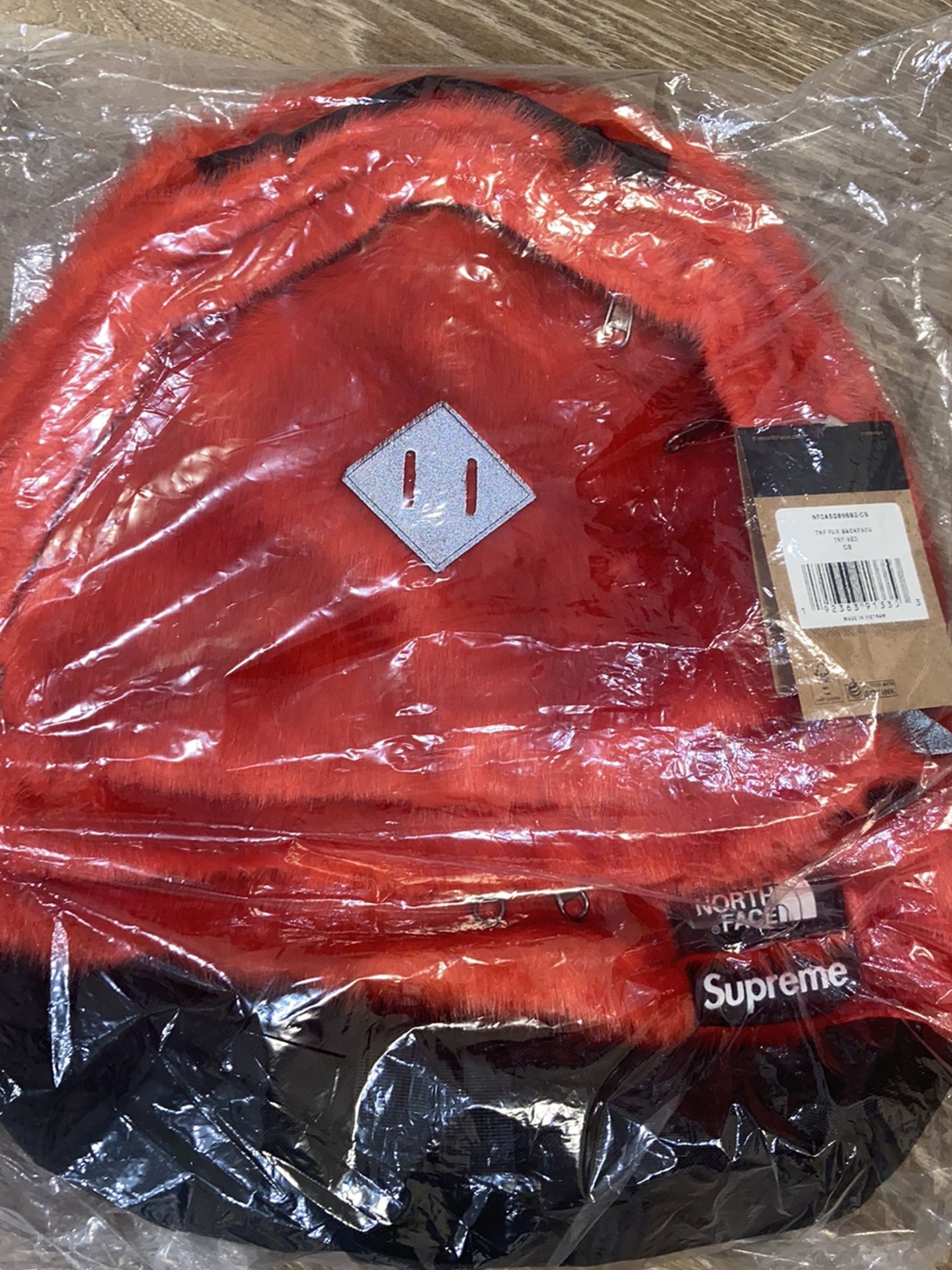 Supreme x The North Face Faux Fur Backpack (Red) for Sale in