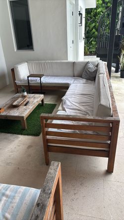 Wood patio couch, coffee table and chairs