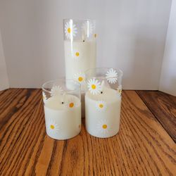 Daisy Flame-less Candles- Set Of 3, with AA batteries included.