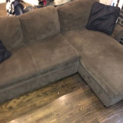 Brown Sectional Couch + Pull Out Bed And Storage