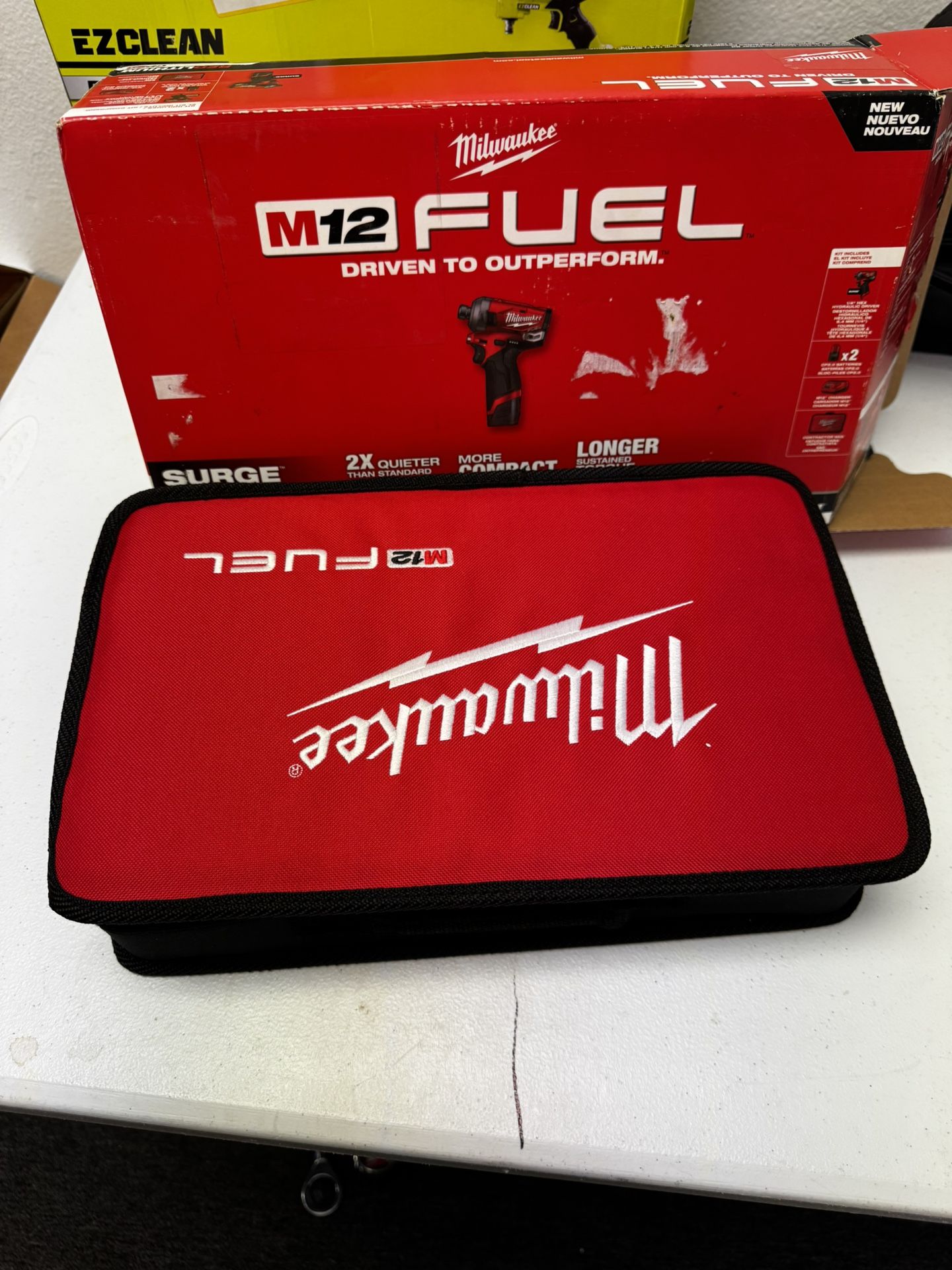 M12 FUEL SURGE 12V Lithium-Ion Brushless Cordless 1/4 in. Hex Impact Driver Compact Kit w/Two 2.0Ah Batteries, Bag